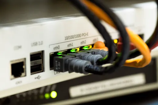 A network switch with visible ports and connections